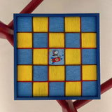 Close-up front view of the textured fiber wall art showing the yellow and blue textured checkerboard pattern and a central Snoopy space patch.