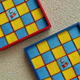 Two textured Snoopy art pieces arranged together, showing the thickness of the soft cotton cord fibers and the detailed craftsmanship of the blue fabric borders.