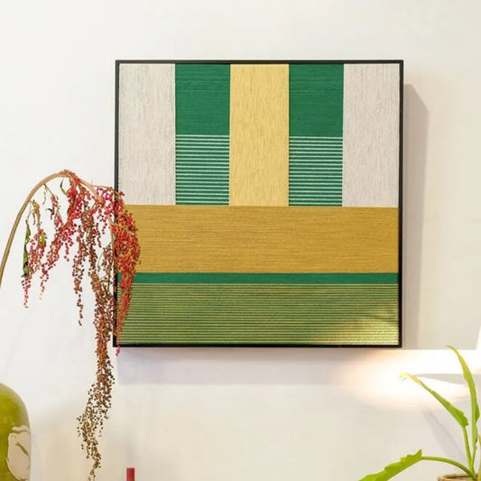 Spring Breeze Wheat Field hand-woven wool yarn wall art featuring alternating vertical stripes of fresh green, creamy beige, and golden wheat tones in a natural wood frame
