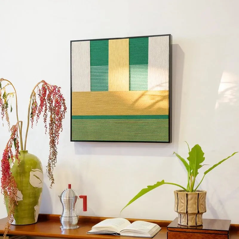 Spring Breeze Wheat Field hand-woven yarn wall art styled on a tabletop next to crafting tools and yarn balls, highlighting precise stripe alignment and vibrant color palette
