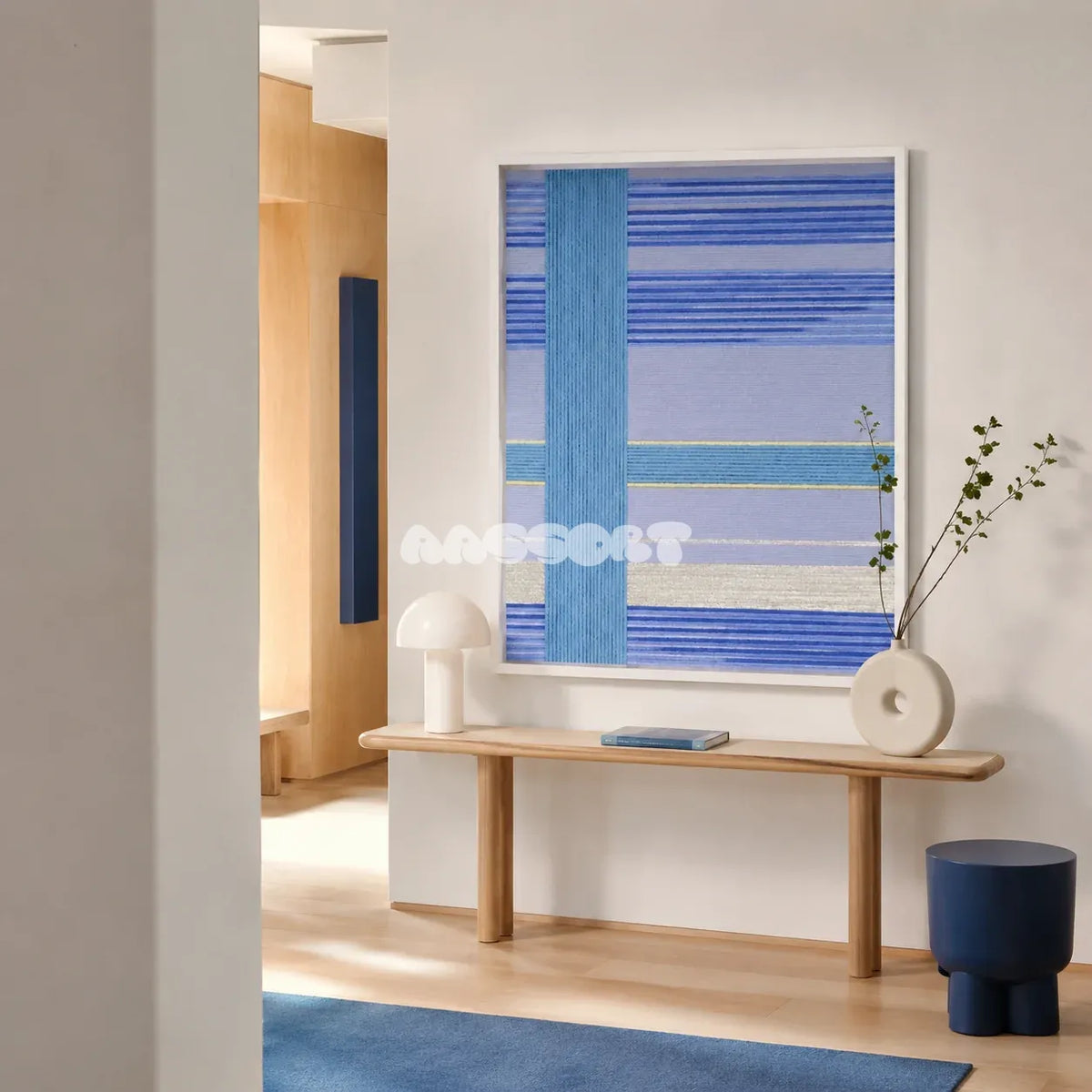 Blue Sea SQ008 blue cyan silver and yellow soft cotton cord wall art above a slim wood console in a minimalist entryway