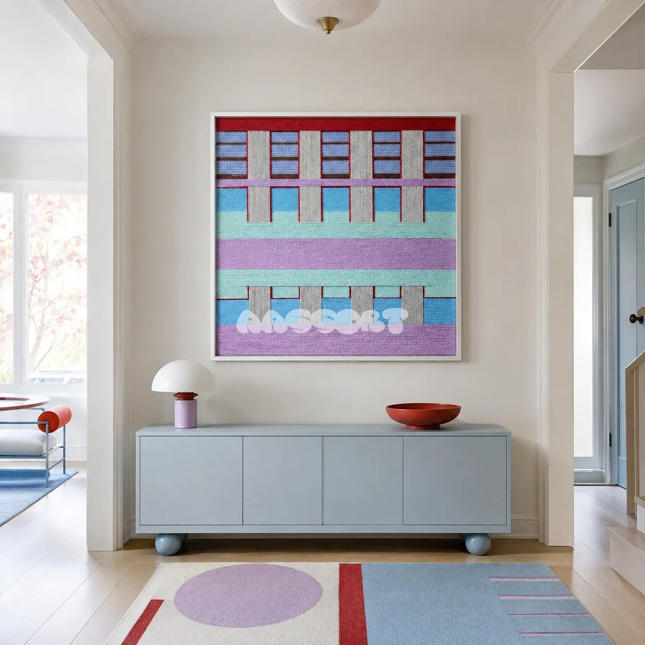 Hanosen Anji SQ010 lavender mint blue cream red and brown soft cotton cord wall art above a pale blue sideboard in a modern entryway