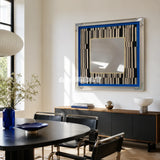 Inception SQ016 framed textile mirror art with black-and-white yarnwork displayed in a sunlit dining room