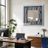 Inception SQ016 framed textile mirror art with a blue border hanging above a modern home office desk