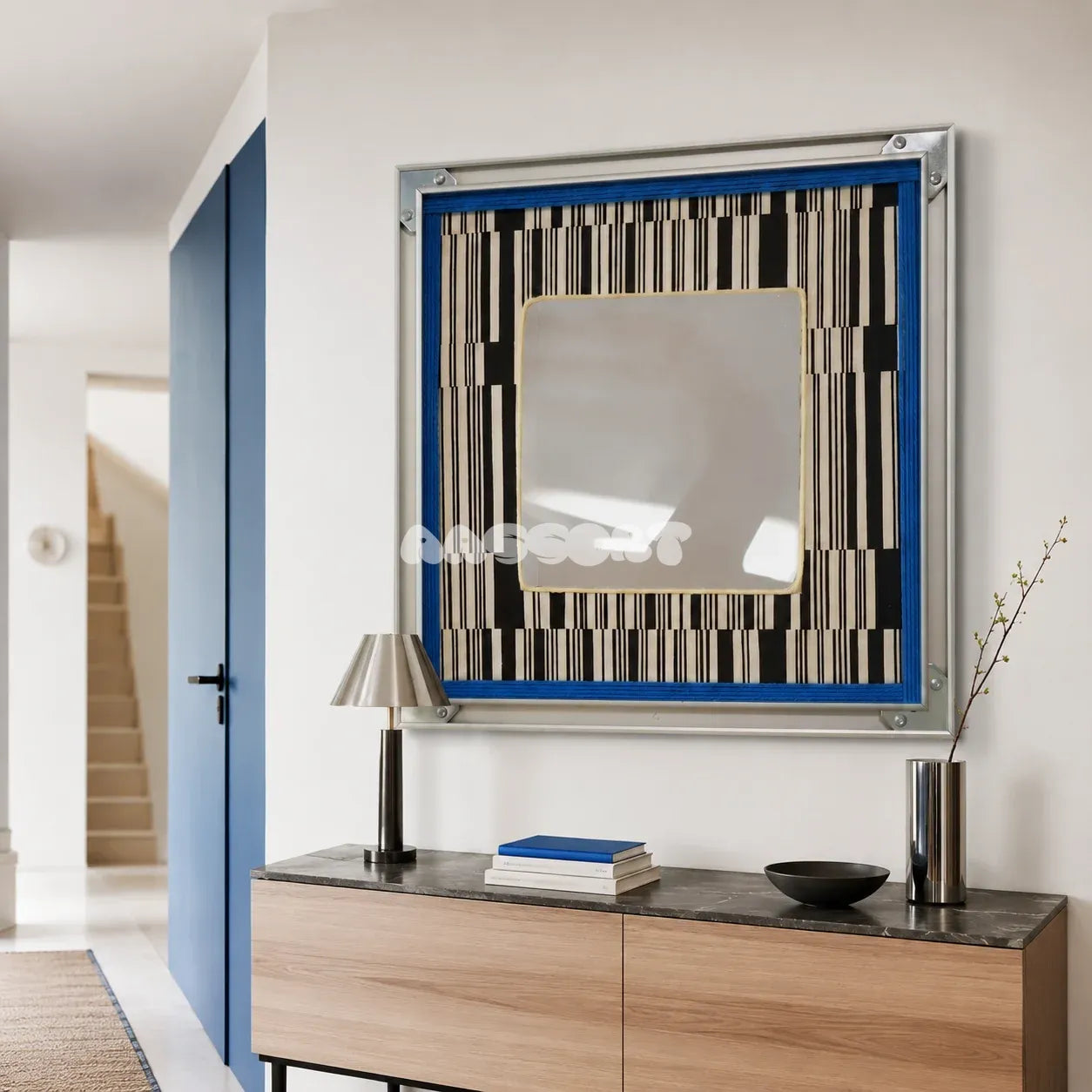 Inception SQ016 framed textile mirror art displayed above a light wood console beside a blue entryway door