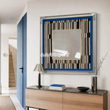 Inception SQ016 framed textile mirror art displayed above a light wood console beside a blue entryway door
