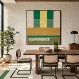 Wheat Field SQ017 green, yellow and beige framed textile art above a walnut table in a bright dining room