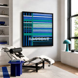 Blues Harmony SQ019 framed geometric yarn art above a black-and-white cowhide chaise in a sunlit reading room