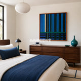 Summer Night's Serenity SQ026 blue black and green framed yarn art above a walnut dresser in a serene blue bedroom
