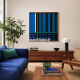 Summer Night's Serenity SQ026 blue black and green framed yarn art above a blue sofa in a bright modern living room