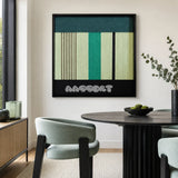 Green Branches SQ027 green cream and black framed yarn art above a round table in a bright modern dining room