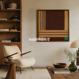 Earthy Fragrance SQ028 brown tan and green framed yarn art above a white boucle chair in a cozy reading corner