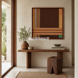 Earthy Fragrance SQ028 brown tan and green framed yarn art above a wood console in a warm minimalist entryway