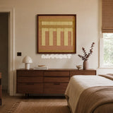 Autumn Mountain SQ034 tan blush and golden yellow framed yarn art above a wood dresser in a warm neutral bedroom