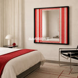 Wave Tide SQ035 red and white striped framed yarn mirror art beside a bed with a red throw in a bright modern bedroom