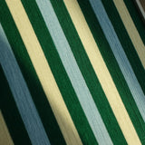 Macro close-up of Spring Lake SQ039 showing the dense green blue and cream vertical yarn stripes and tactile fiber texture