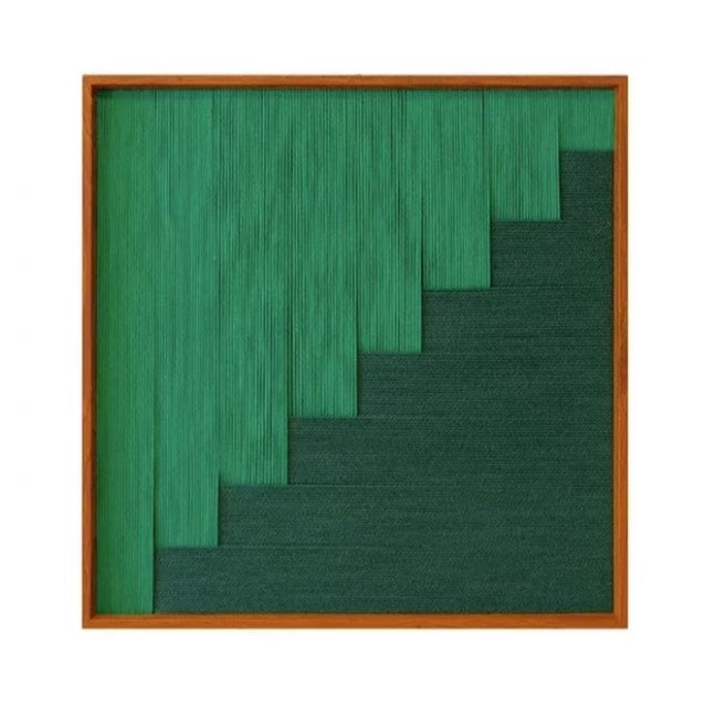 Front view of the Azure Sky Woven Green Forest fiber wall art variant on a white background