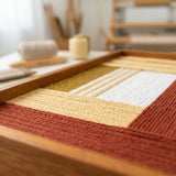 Sun-Baked Terra SQ086 fiber art shown in an artist studio highlighting its dimensional yarn craftsmanship.