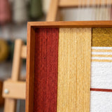 Close-up corner view of Sun-Baked Terra SQ086 highlighting tactile soft cotton cord and the sleek frame finish.