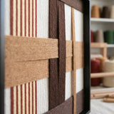 Angled studio close-up of Pulse of the Soil SQ088 highlighting its dimensional soft cotton cord craftsmanship.