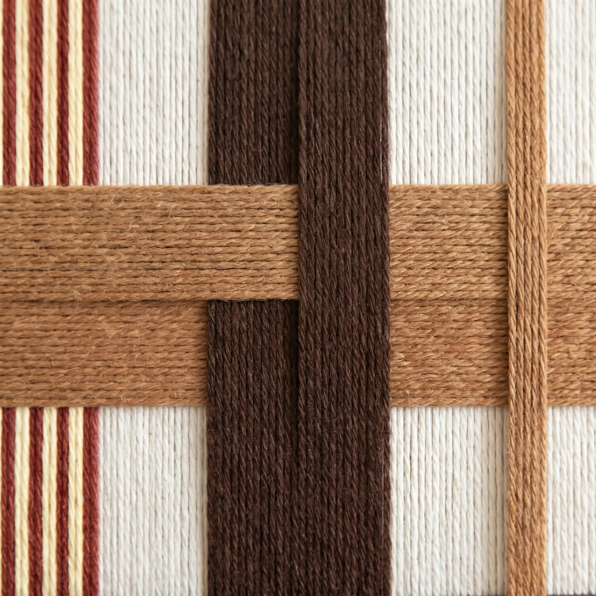 Macro view of Pulse of the Soil SQ088 showing interlocking brown and terracotta soft cotton cord textures.