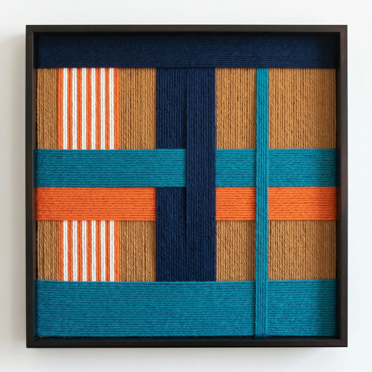 Front view of Tropical Glow SQ089 geometric yarn wall art in a black square frame on a white background.