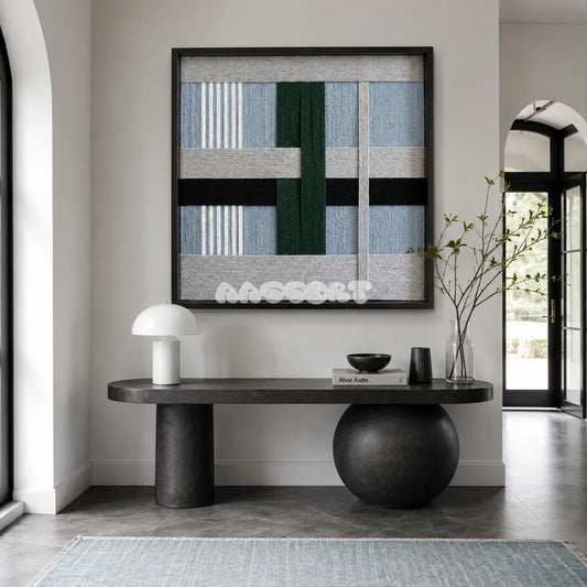 Moonlight Glade SQ092 framed textile art with white, ash gray, forest green, charcoal, and misty blue yarn layers.