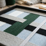 Macro view of Moonlight Glade SQ092 showing forest green, navy, and light blue soft cotton cord texture.
