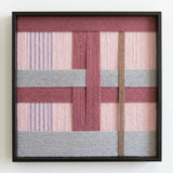 Front view of Bloom Forecast SQ095 geometric yarn wall art in a black square frame on a white background.