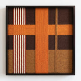 Front view of Sunlit Symphony SQ099 featuring a bold orange cross motif and striped cream accents in a black frame.
