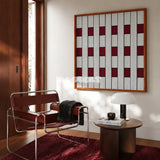 Ruby Lattice SQ106 framed fiber artwork featuring interwoven ruby and white checkerboard yarn blocks.