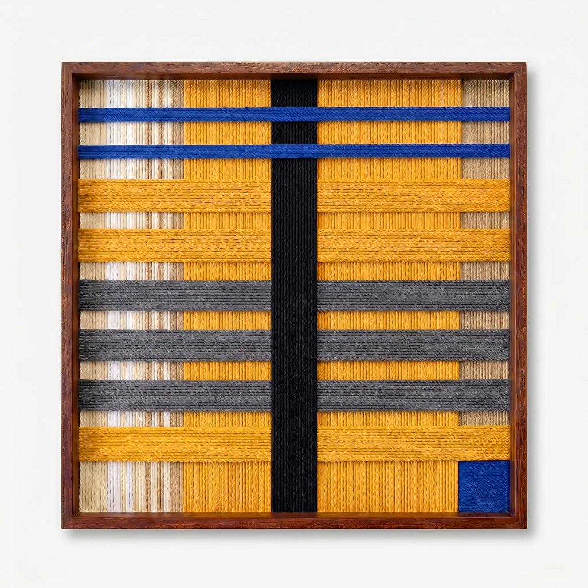 Front view of Golden Monsoon SQ110 yellow, gray, and black geometric yarn wall art in a frame on a white background.