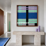Winter Aurora SQ112 geometric textile wall art displayed as a dramatic cool-toned interior statement piece.