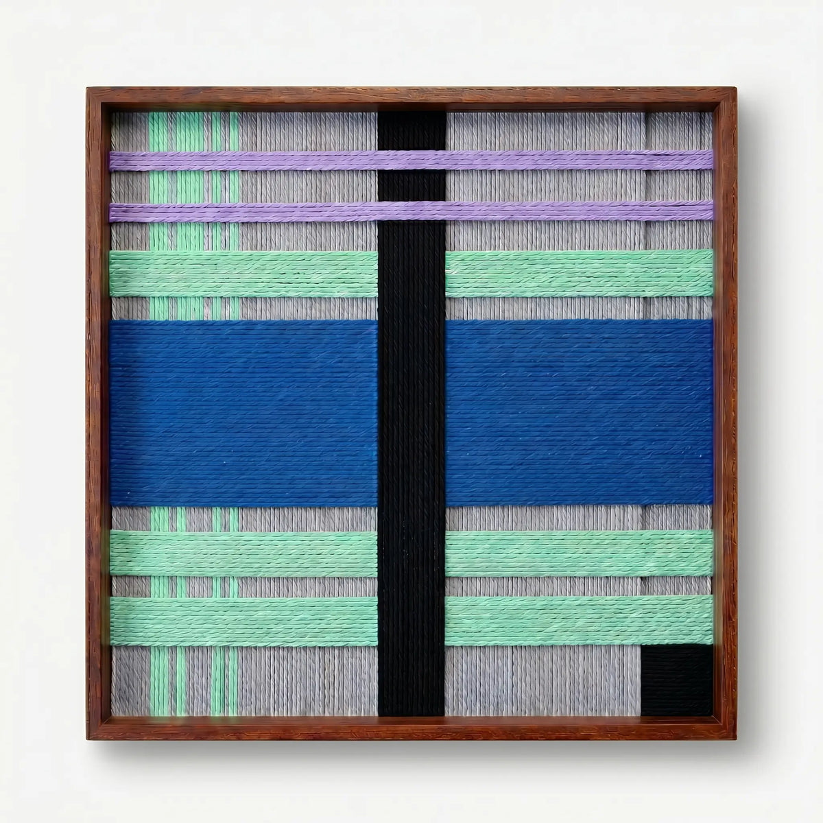 Front view of Winter Aurora SQ112 cobalt, mint, and lavender geometric yarn wall art in a frame on a white background.
