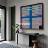 Cobalt Window SQ113 framed fiber artwork featuring a bold cobalt cross with mint and purple accents.