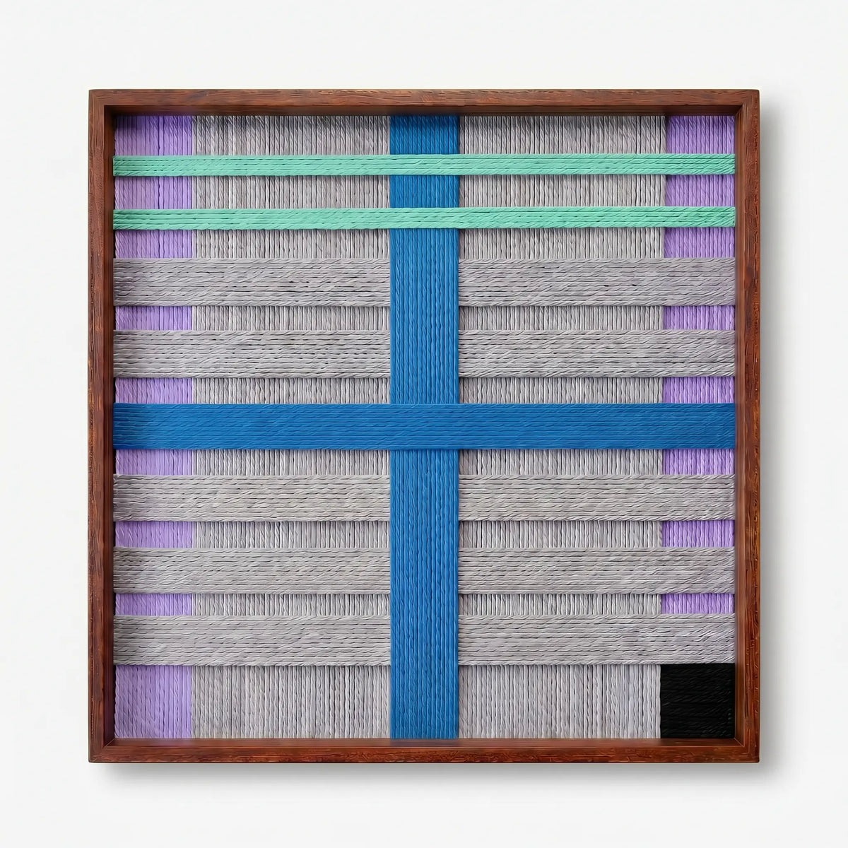 Front view of Cobalt Window SQ113 blue cross and mint stripe yarn wall art in a frame on a white background.