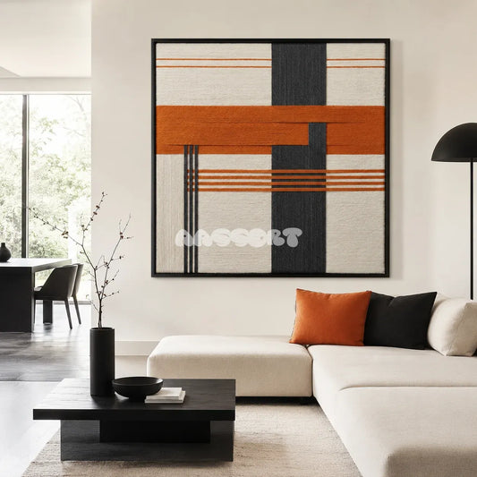 Terracotta Dusk SQ114 framed textile art with cream, charcoal gray, and burnt orange geometric yarn.