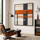 Terracotta Dusk SQ114 framed fiber artwork featuring bold charcoal and terracotta bands over cream yarn.