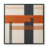 Front view of Terracotta Dusk SQ114 orange, charcoal, and cream yarn wall art in a black frame on a white background.