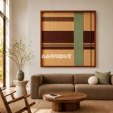 Cedar and Sage SQ119 framed textile art with sage green, cedar brown, and golden beige asymmetric geometry.
