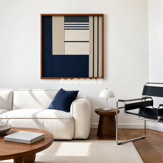 Baltic Window SQ128 framed textile art with deep navy, sandy beige, crisp white, and dark grey geometric yarn.