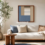 Cerulean Mist SQ130 framed textile art with cerulean blue, sandy beige, crisp white, and earthy taupe geometric yarn.