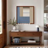 Cerulean Mist SQ130 framed yarn wall art featuring asymmetric blue blocks, white bands, beige stripes, and taupe accents.
