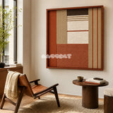 Terracotta Haven SQ132 framed yarn wall art featuring asymmetric terracotta blocks, white bands, beige stripes, and brown accents.