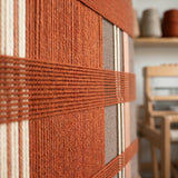 Low-angle close-up of Tuscan Plaid SQ138 highlighting raised terracotta, brown, taupe, and cream yarn texture.