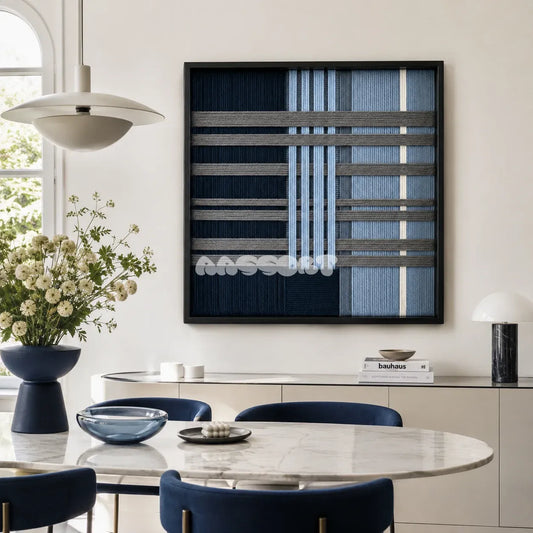 Starry Latitude SQ145 framed textile art with navy blue, icy blue, and cream architectural yarn geometry.