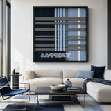 Starry Latitude SQ145 framed yarn wall art featuring structured navy, blue, and cream geometric forms.
