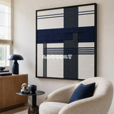Midnight Axis SQ146 framed yarn wall art featuring bold intersecting navy and charcoal bands on white.