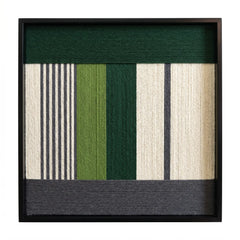 Direct front view of The Interval hand-woven wool wall art showing the intricate vertical stripes and deep green horizontal fiber textures.