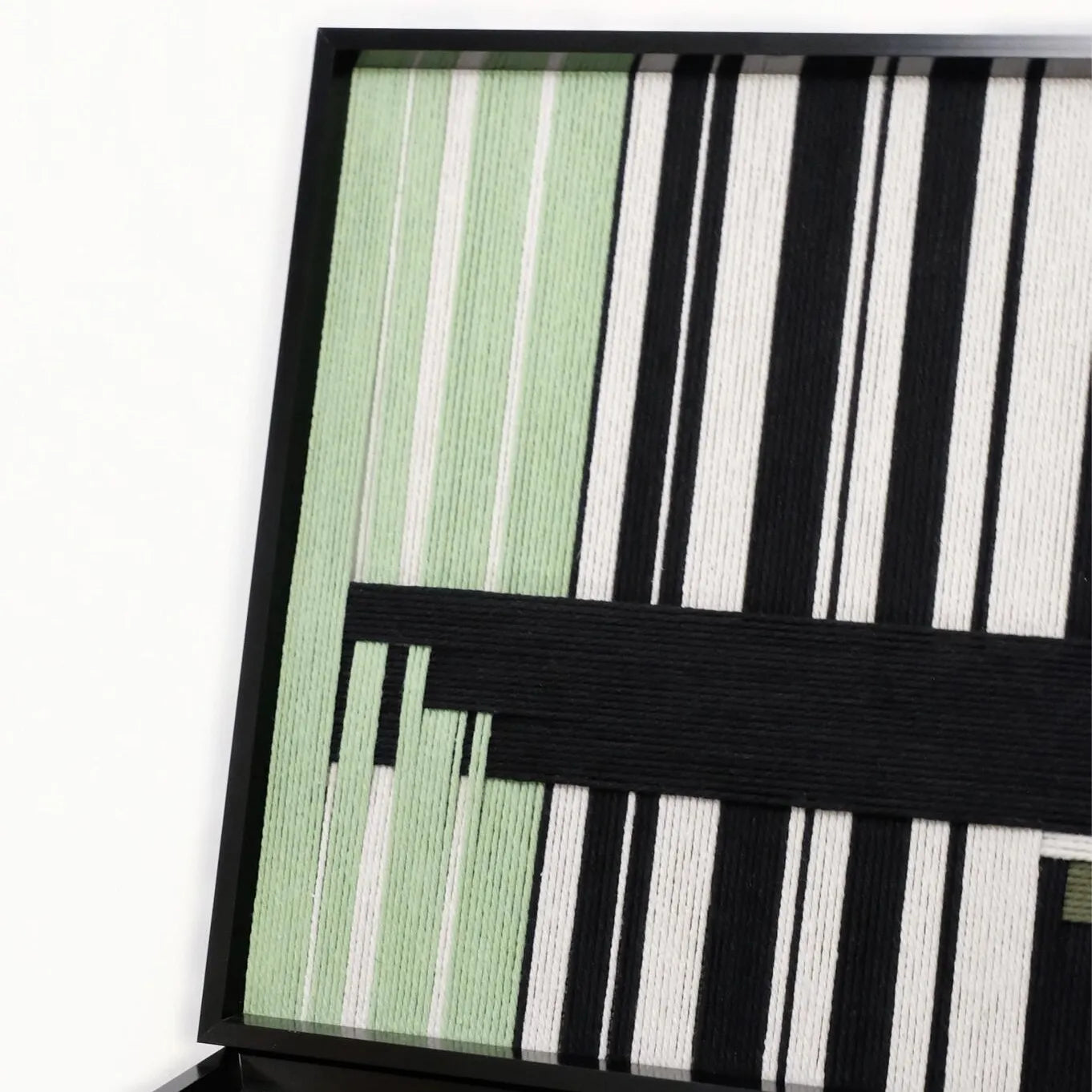 Front view of the left panel of Timeless Moments diptych on a plain white background, highlighting its emerald and black stripe composition.

